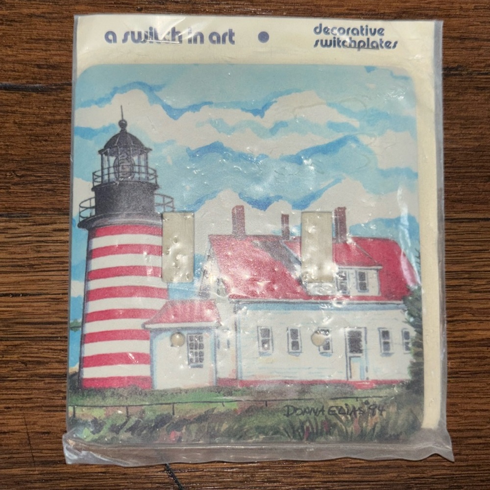 Donna Elias 1984 lighthouse switch plate metal painted